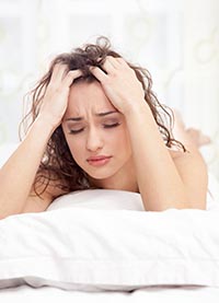 Beautiful woman having a headache